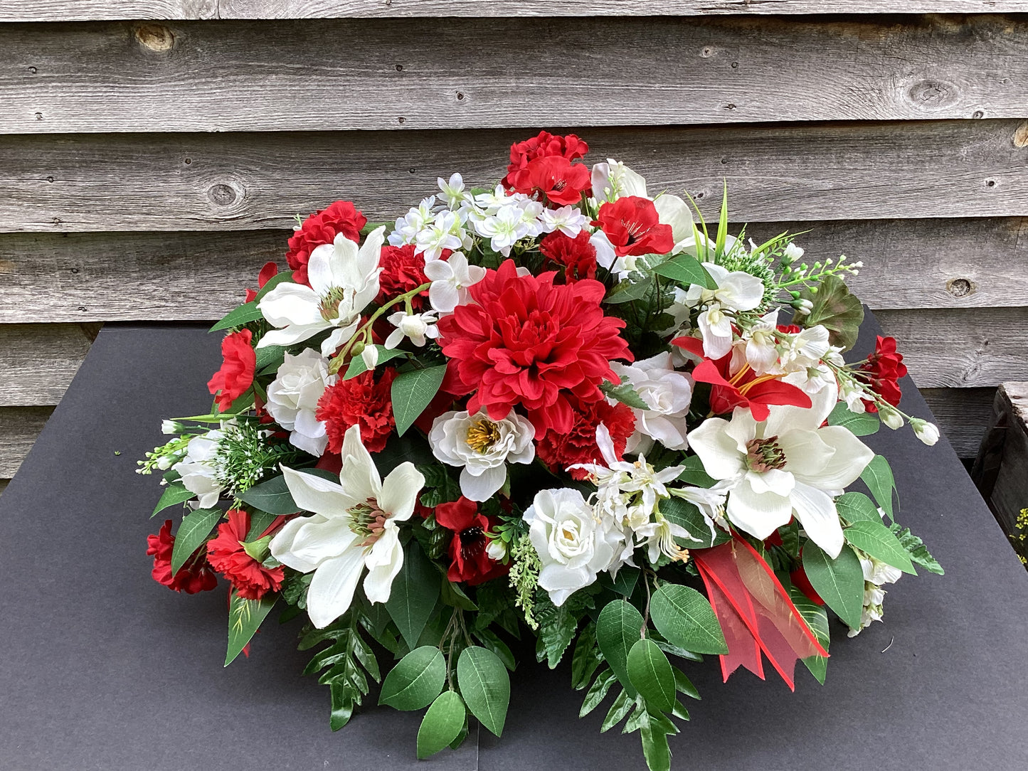 Cemetery Saddle, Red and White Headstone Flowers