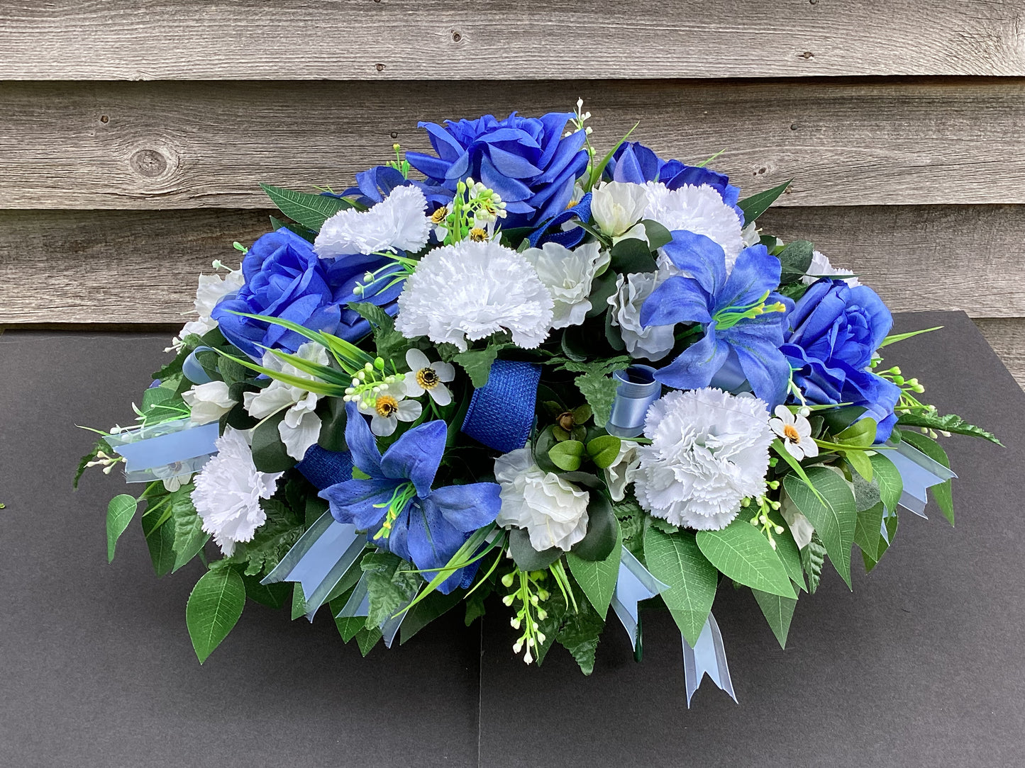 Cemetery Saddle, Blue and White Memorial Flowers