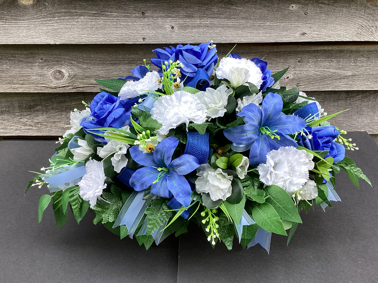 Cemetery Saddle, Blue and White Memorial Flowers
